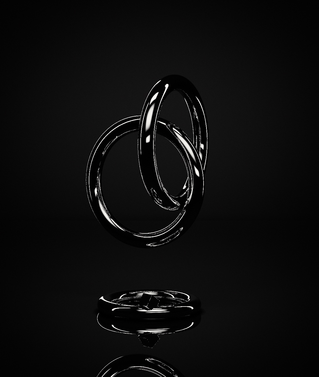 Three interlocking polished rings on a black mirror surface